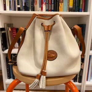 Dooney & Bourke Pebble Grain Cream and Brown Bucket Drawstring Bag